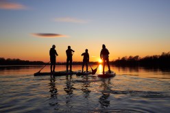 Ocean vs. Lake Paddle Boarding: Which is Safer for Beginners?